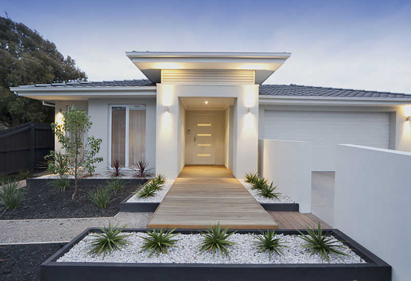 A single story home with Sustainable Landscaping